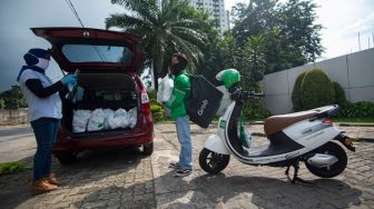 Gandeng YPO, Grab Berbagi Kebahagiaan Ramadan di Tengah Pandemi Covid-19