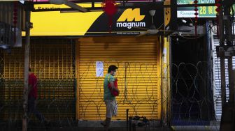 Warga beraktivitas di kawasan Pudu, Kuala Lumpur, Malaysia, Minggu (17/5). [ANTARA Foto/Rafiuddin Abdul Rahman]