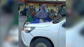 Ikut Ambil Paksa Jenazah Corona dari Ambulans, Dua Wanita Jadi Tersangka