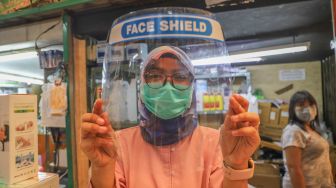 Rasa Aman Palsu, Penggunaan Face Shield Tanpa Masker Dilarang di Swiss