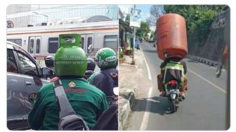 Warganet Ngakak Ada Orang Pakai Helm Tandon Air: Inovasi Baru Nih