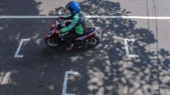 Pembatas Jarak Bagi Pengendara Motor