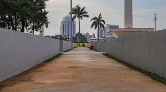 Suasana Monumen Nasional (Monas) di Jakarta Pusat, Kamis (18/6). [Suara.com/Alfian Winanto]
