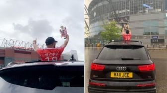 Pakai Trofi Replika, Fans Liverpool Pamer Juara di Markas Man City dan MU