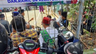 Temuan KPAI di Apel Ganyang Komunis: Anak-anak Merokok dan Berbagi Hisapan