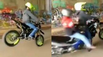 Atraksi Sembarangan di Tengah Jalan, Ulah Pemotor Ini Bikin Orang Celaka