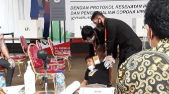 Begini Aksi KPU Tangani Pemilih Bandel Tak Bermasker hingga Bersuhu Tinggi