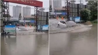 Momen Kocak saat Mobil Elektrik Menerjang Banjir, Bisa Jadi Kapal Selam?