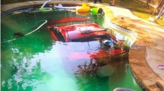 Begini Jadinya Kendarai Mobil Saat Mabuk, Tembok dan Kolam Jadi Sasaran