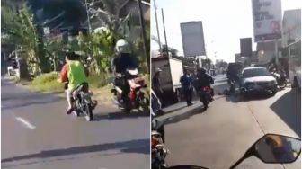 Pemotor Ini Nekat Melawan Arus dan Tabrak Mobil, Diduga Berkebutuhan Khusus