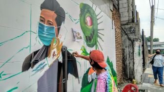 Keren! Komunitas di Medan Kampanyekan Protokol Kesehatan Lewat Mural