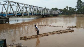 Diguyur Hujan Deras Sejak Semalam, BPBD Tangerang: Sungai Cisadane Siaga 2