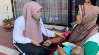 PMM 35 UMM Berikan Cek Kesehatan Gratis untuk Warga Desa Telaga Murni