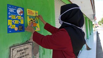 PMM 74 UMM Lakukan Edukasi Masyarakat Desa Mandesan Tentang New Normal