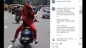 Tak Pakai Helm dan Bonceng Motor Hadap Belakang, Perempuan Ini Tuai Kecaman