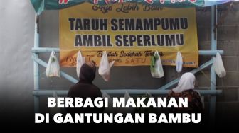 Covid-19: Aksi Atik dan Ibu Lainnya Berbagi Makanan di Gantungan Bambu