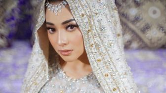 Menilik Mewahnya Baju Pengantin Nikita Willy dan Indra Priawan