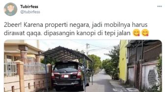 Viral Mobil Pelat Merah Parkir di Tepi Jalan Pakai Kanopi, Publik Dongkol