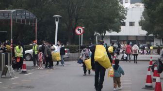 Di Wuhan, Tim WHO Mulai Investigasi Asal-usul Virus Corona