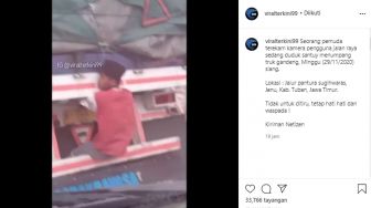 Viral Pemuda Duduk Santai di Ekor Truk Gandeng, Warga: Nge-prank Malaikat