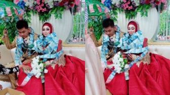 Pengantin Baru Ini Diberi Kalung Lembaran Uang, Warganet: Resepsi Sultan