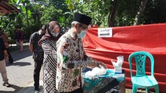 Terapkan Prokes Ketat, Ini Suasana TPS 006 Bantul Lokasi Cabup Abdul Halim