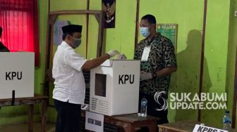 Nyoblos di Palabuhanratu Sukabumi, Iman Bicara Pilkada di Tengah Pandemi