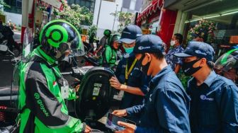 Studi Baterai Kendaraan Listrik, Pertamina Kolaborasi dengan Gojek