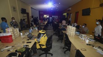 Suasana acara Syukuran Tahunan Suara.com di Kantor Redaksi Suara.com, Jakarta, Rabu (30/12/2020). [Suara.com/Angga Budhiyanto]