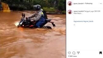 Masih Nekat Terobos Banjir saat Naik Motor? Efek Ngeri