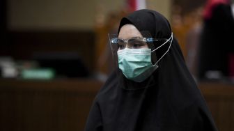 Lepas Jilbab saat Bebas Penjara, Seperti Ini 4 Penampilan Eks Jaksa Pinangki