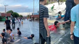 Viral Warga Asyik Rebahan di Tengah Banjir, Warganet Salah Fokus ke Airnya