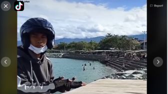 Larangan Jadi Perintah, Sekelompok Orang Nekat Berenang di Kolam Buaya