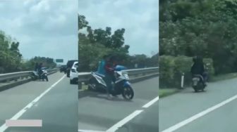 Naik Motor Bonceng 3, ABG Ini Nekat Melawan Arah dan Menerobos Jalan Tol