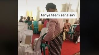 Bukannya Duduk Manis di Pelaminan, Pengantin Pria Malah Sibuk saat Resepsi