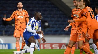 Penyerang Porto Moussa Marega merayakan golnya selama pertandingan leg pertama babak 16 besar Liga Champions antara Porto melawan Juventus di Estadio do Dragao, Porto, Rabu waktu setempat atau Kamis (18/2/2021) dini hari WIB MIGUEL RIOPA / AFP