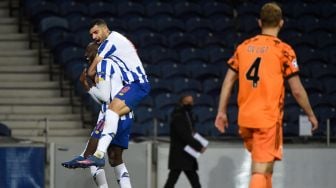 Penyerang Porto Moussa Marega merayakan golnya selama pertandingan leg pertama babak 16 besar Liga Champions antara Porto melawan Juventus di Estadio do Dragao, Porto, Rabu waktu setempat atau Kamis (18/2/2021) dini hari WIB MIGUEL RIOPA / AFP