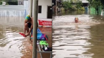 Viral Aksi Pria Nekat Berenang saat Banjir, Warganet: Berasa Atlet Komplek