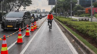 Pesepeda Road Bike Dibolehkan Melintas di Jalur Motor Viral Saat Tertentu Saja