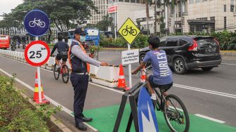 Jadi Lokasi Foto Viral, Anies Izinkan Road Bike Melintas di Jalur Motor Sudirman-Thamrin