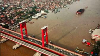 Banjir di Hulu Sumsel Bikin Sungai Musi Keruh, Pasokan Air Bersih di Palembang Menurun