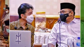 Diskusi dengan Menag, Stiker 'Salib' di Laptop Gibran Dipuji Warganet, Apa Itu?