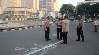 Polri Gelar Olah TKP Kasus Pengemudi Mercedez Tabrak Pesepeda di Bundaran HI