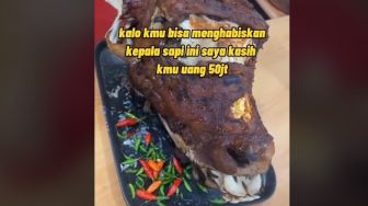 Viral Video Pemuda Makan Kepala Sapi Utuh Dapat Rp 50 Juta dan Mobil