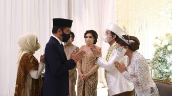 Hadiri Nikah Atta-Aurel, Gaya Hijab Kebaya Iriana Jokowi Curi Perhatian