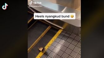 High Heels Nyangkut di Eskalator, Warganet Nangis Berjemaah Lihat Mereknya