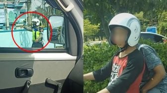 Ngumpet di Balik Mobil, Tegangnya Ekspresi Pemotor saat Ada Polisi Bikin Ngakak