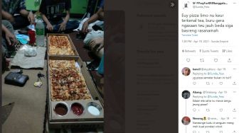 Makan Pizza 1 Meter, Warganet Salah Fokus dengan Penampakan Tak Terduga Ini