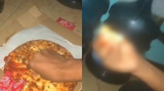 Pria Ini Makan Pizza dengan Cara Tak Terduga, Publik: Nggak Gitu Konsepnya!