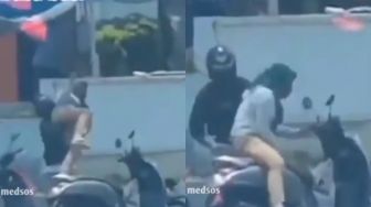 Viral Pria 'Smackdown' Pacar yang Ngambek ke Jok Motor, Tuai Perdebatan